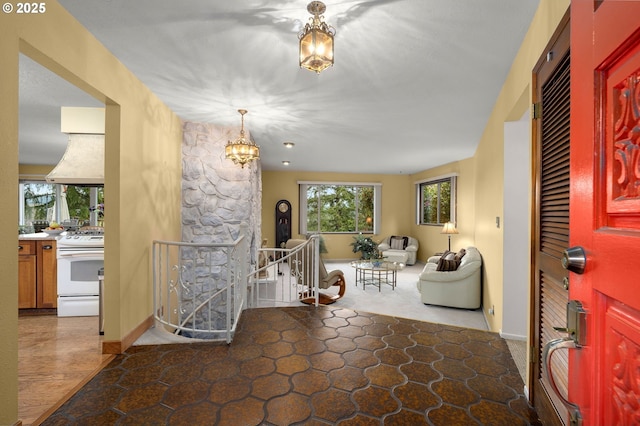16020 SE Monner Rd, Happy Valley, OR 97086 - foyer with a chandelier and baseboards