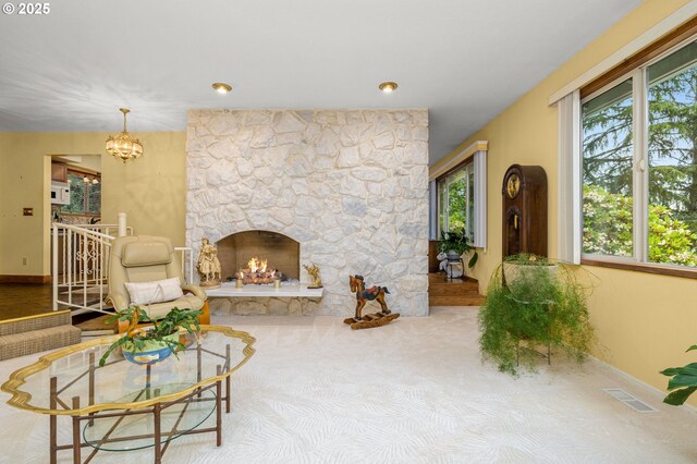 16020 SE Monner Rd, Happy Valley, OR 97086 - living room featuring plenty of natural light, a chandelier, and a fireplace