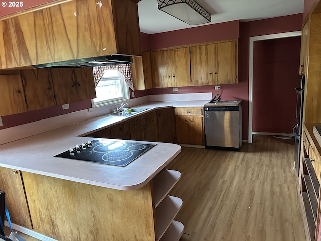 515 May St, Molalla, OR 97038 - kitchen featuring black electric stovetop, a sink, brown cabinetry, light countertops, and dishwasher