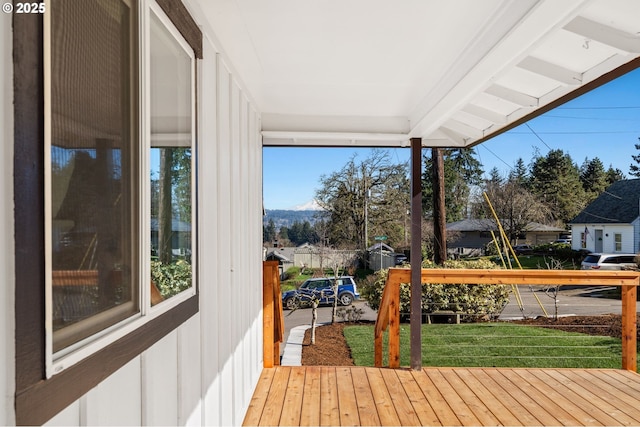 deck featuring a lawn