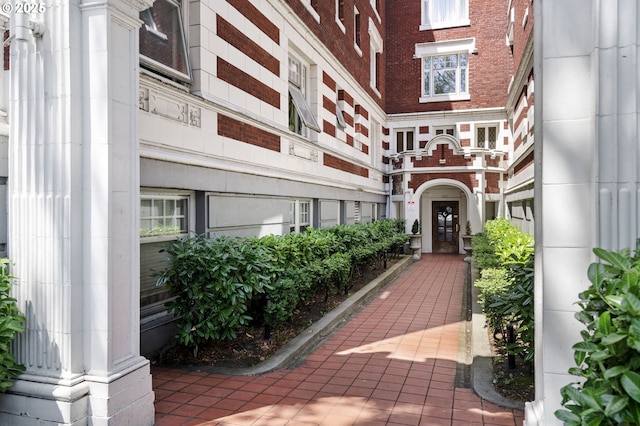 1811 NW Couch St Unit 210, Portland, OR 97209 - view of exterior entry featuring brick siding