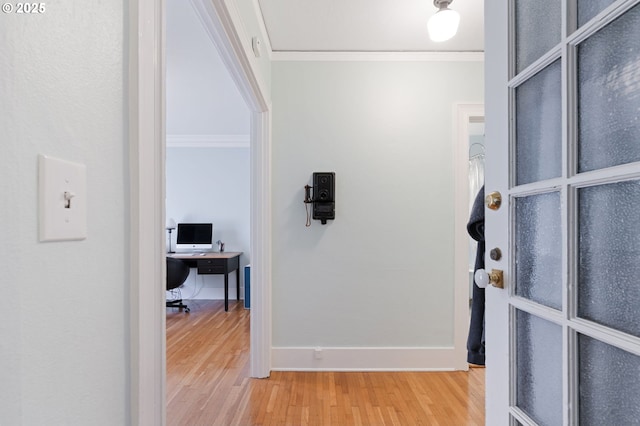1811 NW Couch St Unit 210, Portland, OR 97209 - entryway with light wood-type flooring and crown molding
