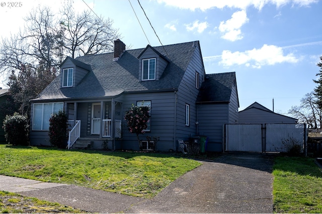 cape cod house with aphalt driveway, a chimney, a shingled roof, a gate, and a front lawn