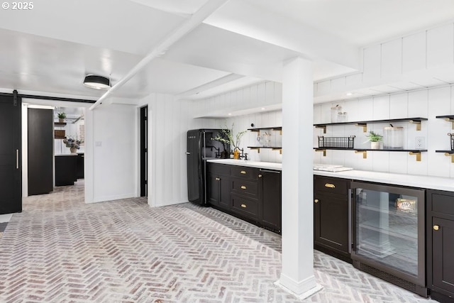 11175 S Riverwood Rd, Portland, OR 97219 - indoor bar featuring wine cooler, freestanding refrigerator, brick patterned floors, and a barn door