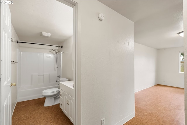 full bathroom with visible vents, baseboards, toilet, vanity, and  shower combination