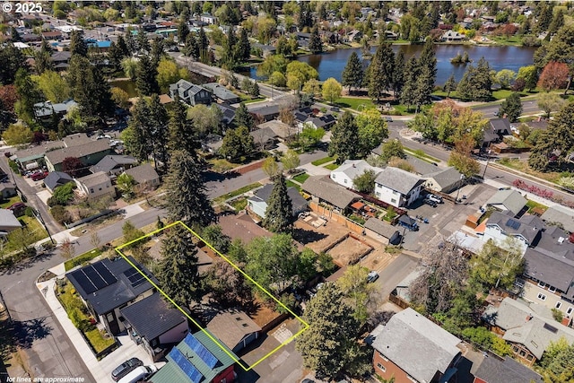 414 NW Riverside Blvd, Bend, OR 97703 - aerial perspective of suburban area with property boundaries highlighted and a large body of water