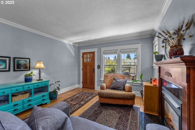 414 NW Riverside Blvd, Bend, OR 97703 - living area with ornamental molding, baseboards, and wood finished floors