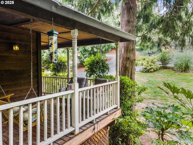 deck featuring covered porch