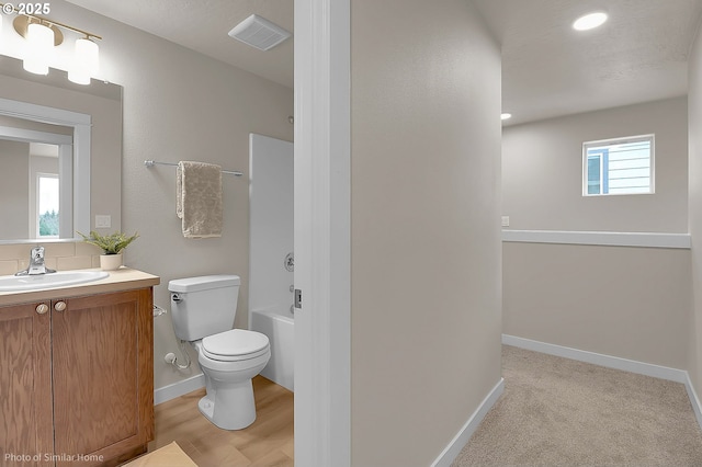 1021 Sommerville Loop, Harrisburg, OR 97446 - full bath with vanity, toilet, baseboards, recessed lighting, and bathing tub / shower combination