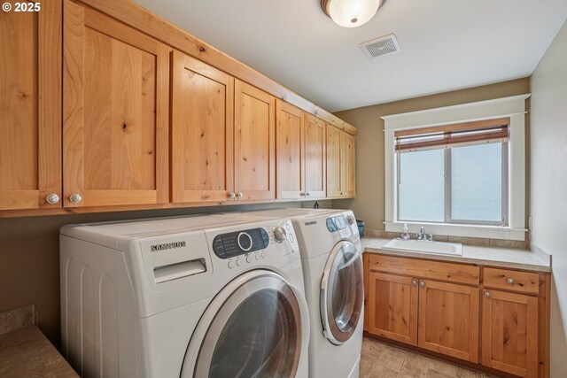 17141 SW King Richard Ct, Sherwood, OR 97140 - laundry room with cabinet space and independent washer and dryer