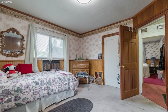 860 Adams St, Eugene, OR 97402 - bedroom featuring wallpapered walls, light carpet, a wainscoted wall, wooden walls, and ornamental molding