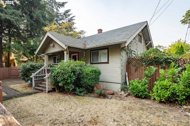 860 Adams St, Eugene, OR 97402 - view of front of house featuring a chimney