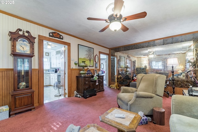 860 Adams St, Eugene, OR 97402 - carpeted living area with crown molding, ceiling fan, a wainscoted wall, and wood walls