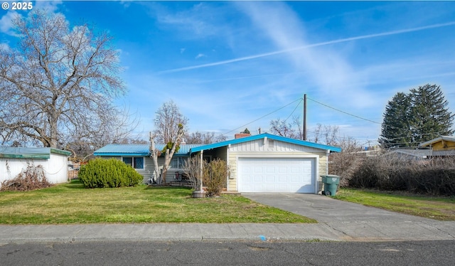 view of front of property with metal roof, driveway, an attached garage, and a front yard