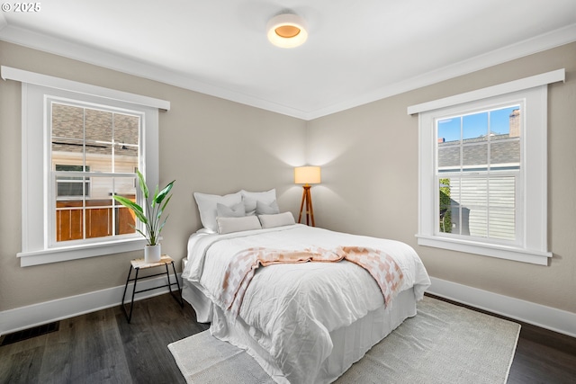6959 N Denver Ave, Portland, OR 97217 - bedroom with baseboards, dark wood-style flooring, and crown molding