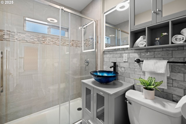 6959 N Denver Ave, Portland, OR 97217 - full bathroom featuring toilet, a shower stall, and vanity
