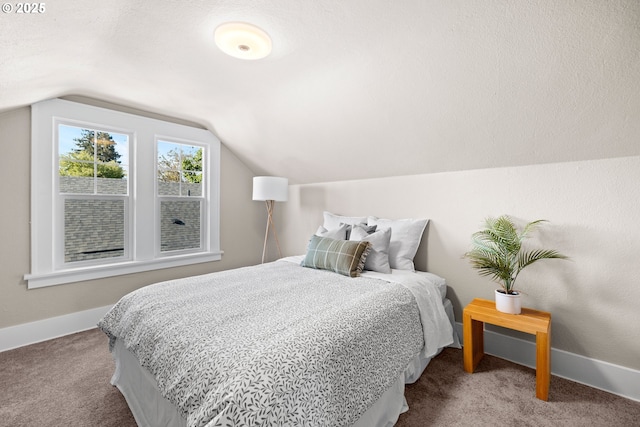 6959 N Denver Ave, Portland, OR 97217 - bedroom featuring carpet flooring, lofted ceiling, and baseboards