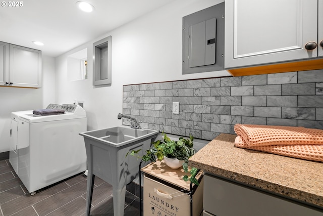 6959 N Denver Ave, Portland, OR 97217 - laundry area featuring electric panel, separate washer and dryer, recessed lighting, and cabinet space