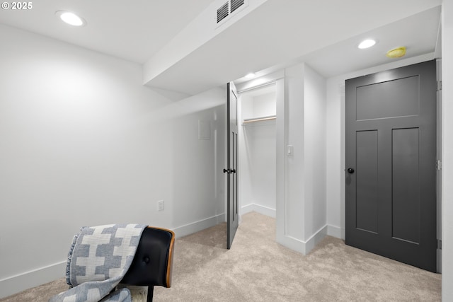 6959 N Denver Ave, Portland, OR 97217 - unfurnished bedroom with light colored carpet, baseboards, a walk in closet, recessed lighting, and a closet