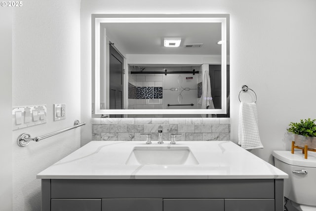 6959 N Denver Ave, Portland, OR 97217 - bathroom featuring a shower, toilet, and vanity