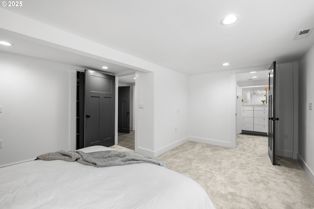 6959 N Denver Ave, Portland, OR 97217 - bedroom with recessed lighting, light carpet, and baseboards