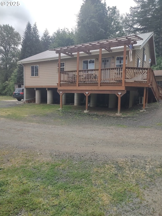 34376 State Highway 38, Scottsburg, OR 97473 - back of property featuring a pergola and a wooden deck