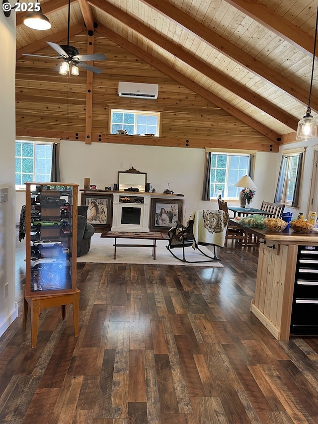34376 State Highway 38, Scottsburg, OR 97473 - living room with ceiling fan, dark wood-type flooring, a wall unit AC, wooden ceiling with exposed beams, and healthy amount of natural light