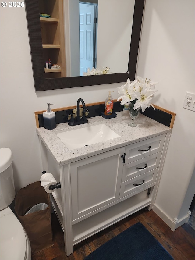 34376 State Highway 38, Scottsburg, OR 97473 - half bath with toilet, vanity, and wood finished floors