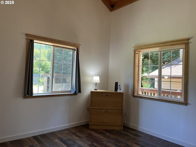 34376 State Highway 38, Scottsburg, OR 97473 - bedroom with dark wood-style flooring, baseboards, and a high ceiling
