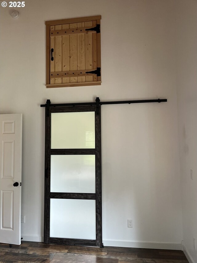 34376 State Highway 38, Scottsburg, OR 97473 - detailed view of baseboards, wood finished floors, and a smoke detector