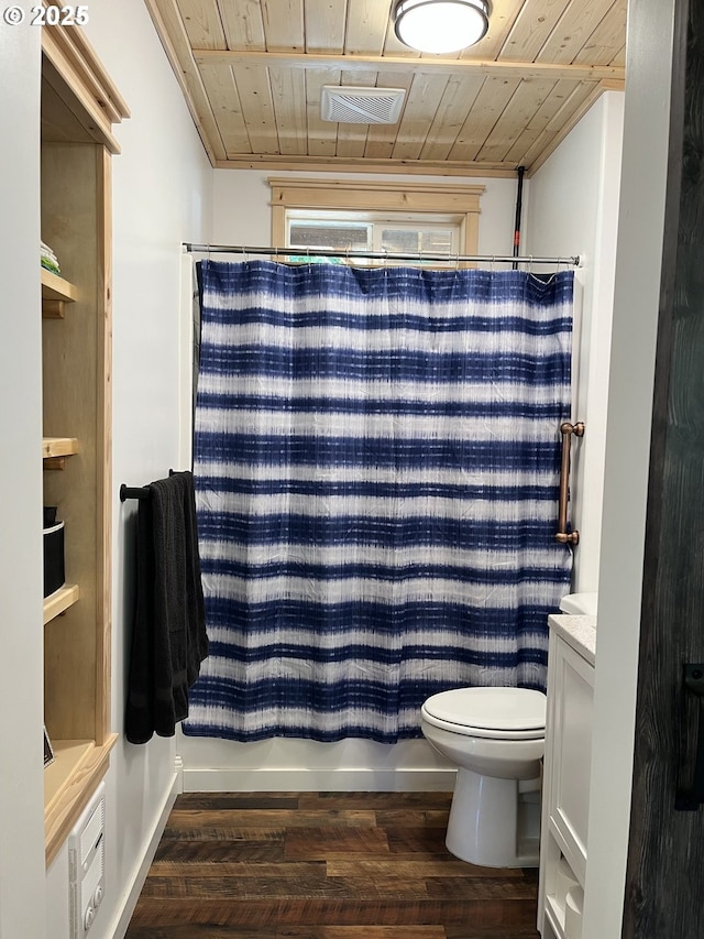 34376 State Highway 38, Scottsburg, OR 97473 - full bath with wood ceiling, wood finished floors, toilet, vanity, and shower / tub combo with curtain