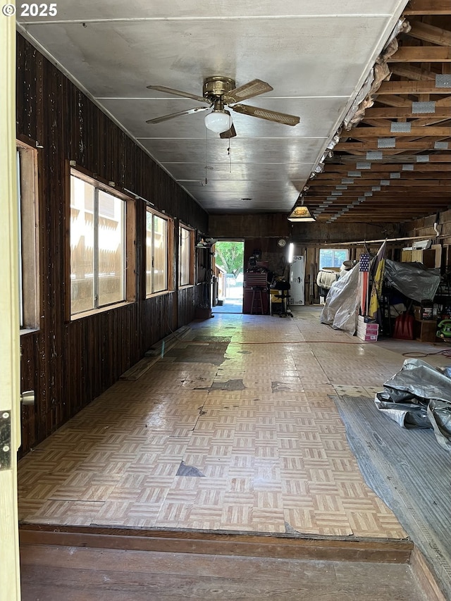 34376 State Highway 38, Scottsburg, OR 97473 - miscellaneous room featuring wood walls and a ceiling fan