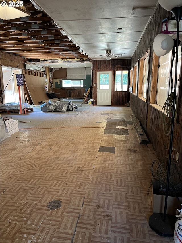 34376 State Highway 38, Scottsburg, OR 97473 - miscellaneous room with wood walls and a ceiling fan