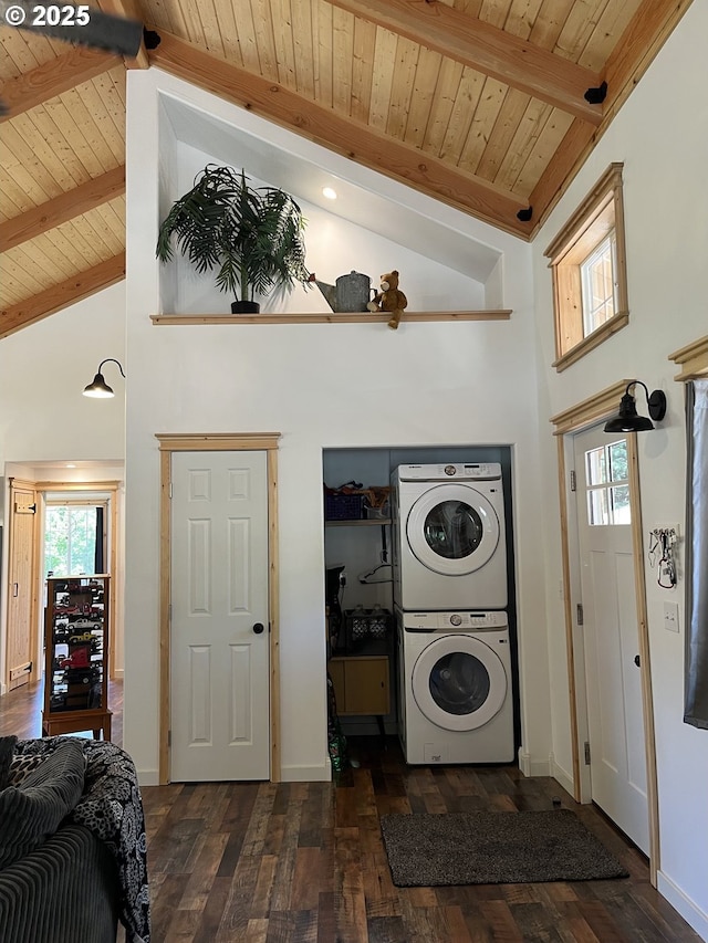 34376 State Highway 38, Scottsburg, OR 97473 - washroom with stacked washing machine and dryer, a high ceiling, wood ceiling, dark wood-type flooring, and baseboards