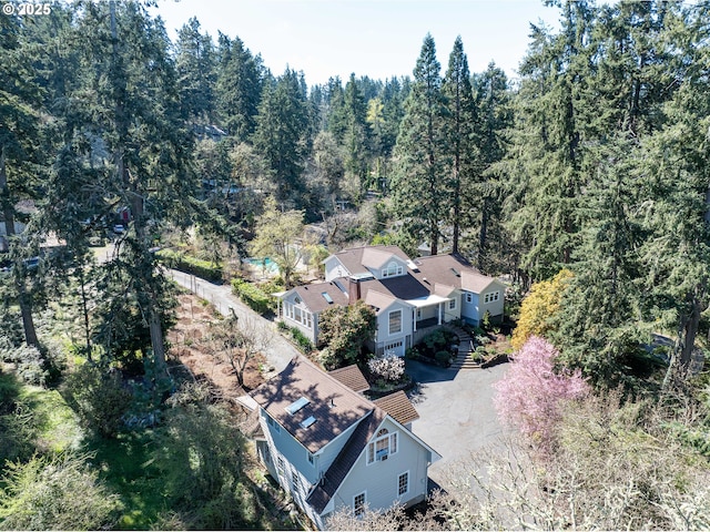 view from above of property featuring a forest