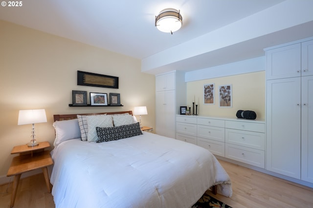 bedroom with light wood-style floors