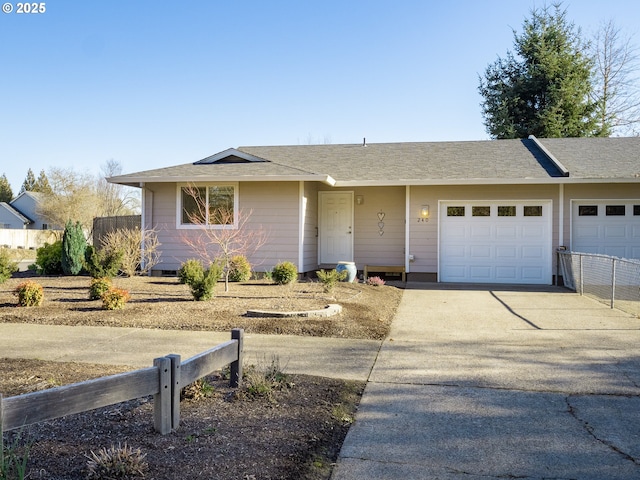 ranch-style home with a garage