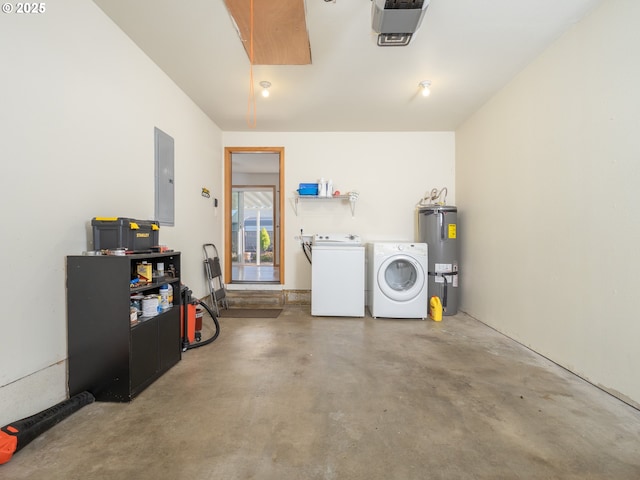 garage featuring washer and dryer, a garage door opener, electric panel, and electric water heater