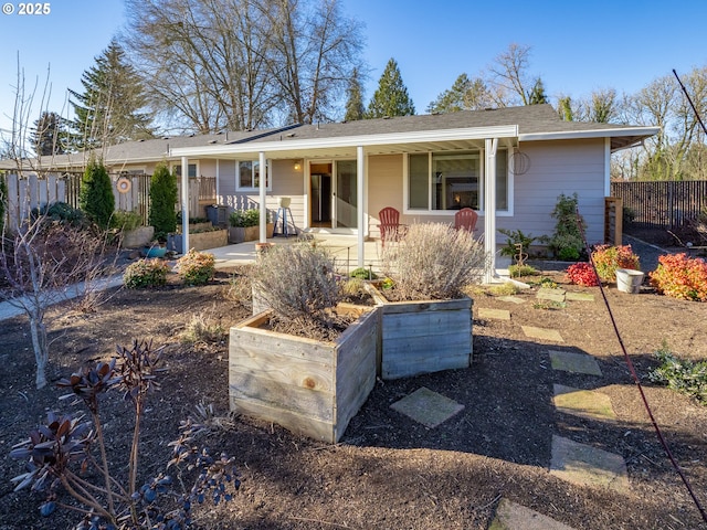 ranch-style home featuring a porch