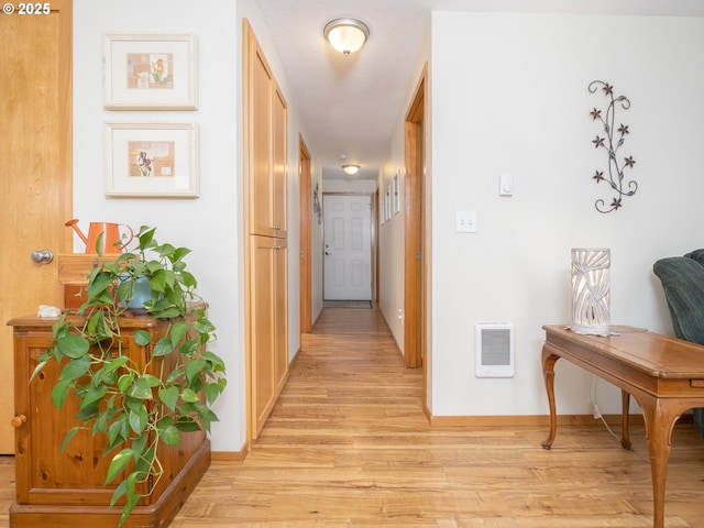 hallway featuring light hardwood / wood-style flooring