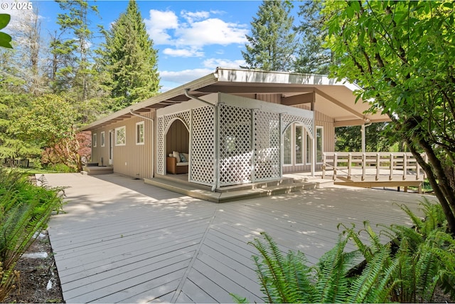 view of home's community featuring a deck