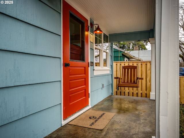 entrance to property with covered porch