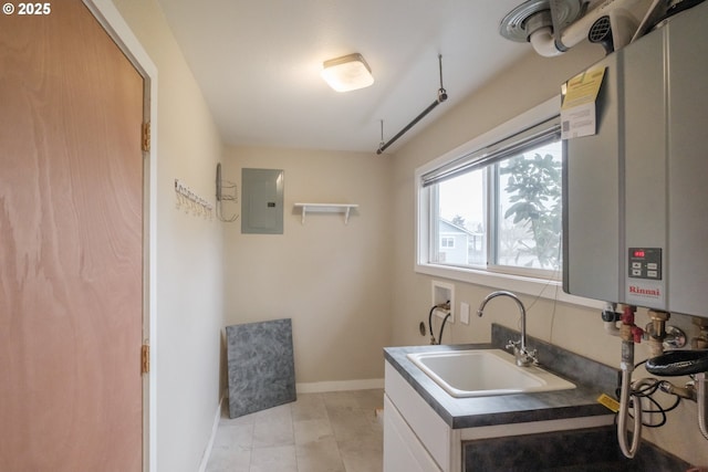 kitchen with tankless water heater, electric panel, a sink, and baseboards