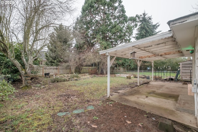 view of yard with a patio area and a fenced backyard