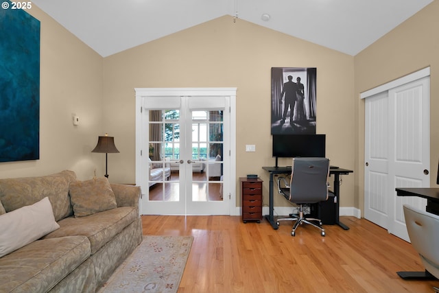 3563 Jake Mann Ln, Florence, OR 97439 - office area with french doors, light wood-style flooring, and vaulted ceiling