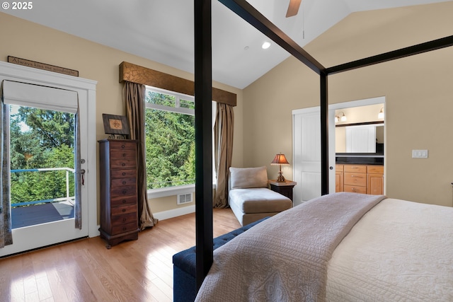 3563 Jake Mann Ln, Florence, OR 97439 - bedroom featuring lofted ceiling, multiple windows, light wood-style floors, access to exterior, and recessed lighting