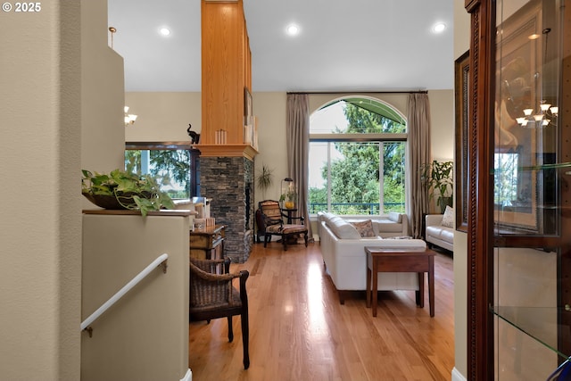 3563 Jake Mann Ln, Florence, OR 97439 - living area featuring healthy amount of natural light, light wood finished floors, a chandelier, and recessed lighting