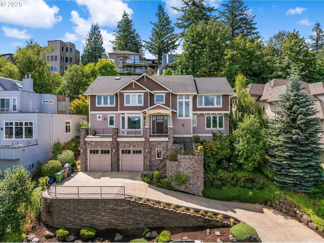 100 Garibaldi St, Lake Oswego, OR 97035 - view of front of property with an attached garage, driveway, stone siding, and a residential view