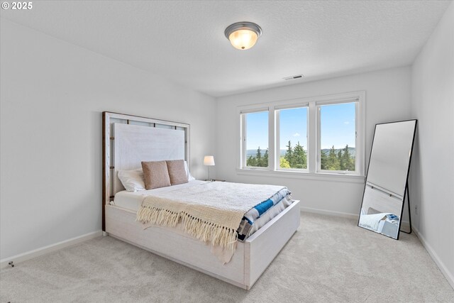 100 Garibaldi St, Lake Oswego, OR 97035 - bedroom featuring light colored carpet and a textured ceiling