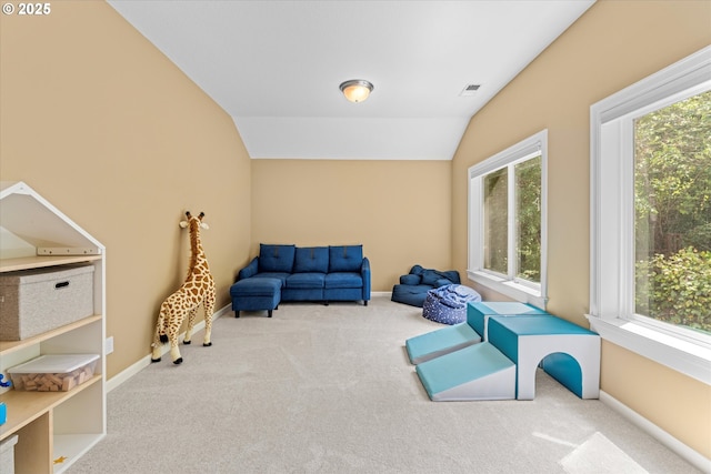 100 Garibaldi St, Lake Oswego, OR 97035 - living area with carpet floors, vaulted ceiling, and healthy amount of natural light